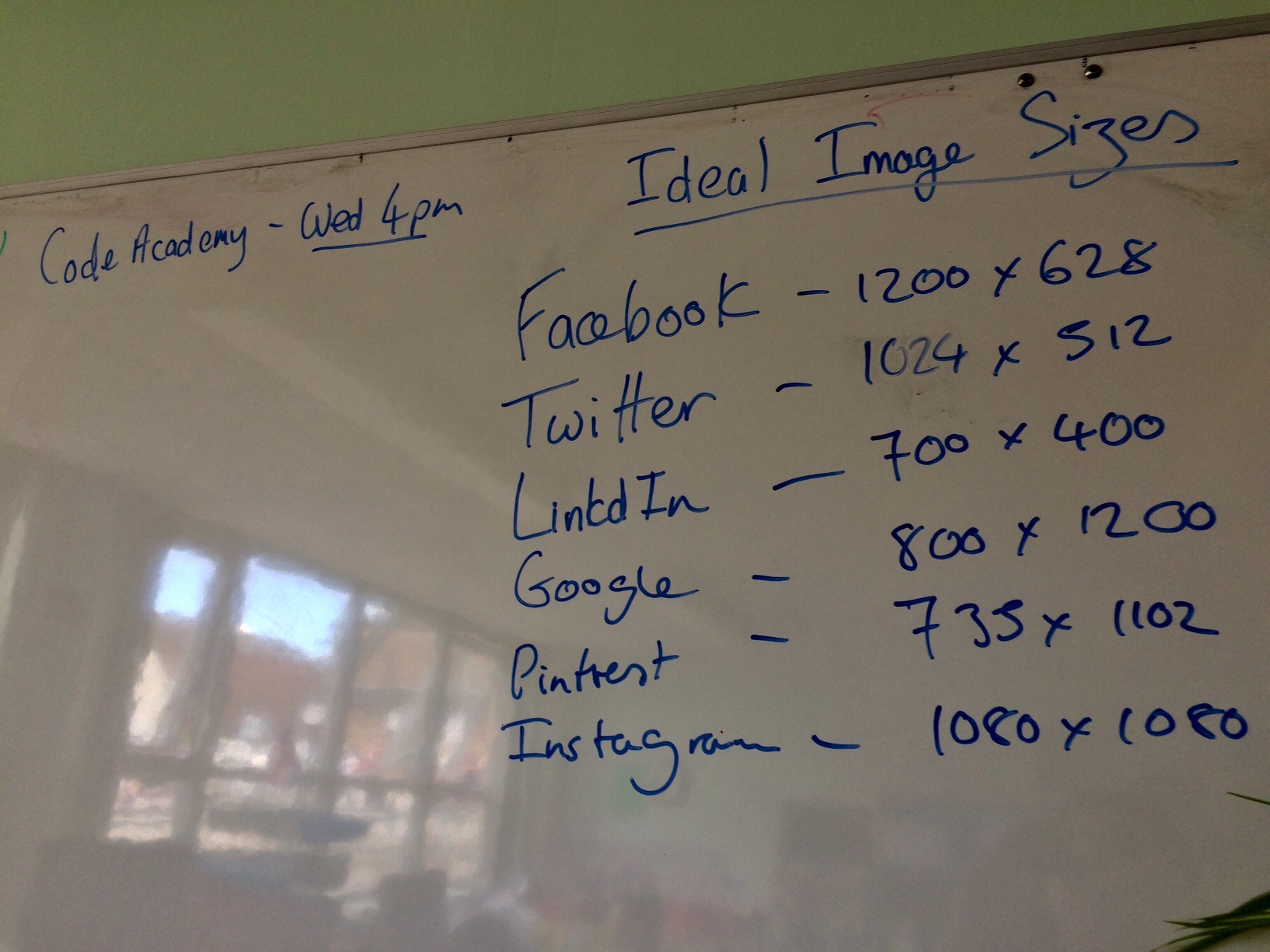 A photo showing a constituency whiteboard listing coding activities