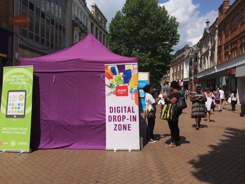 A photo showing the signs on a Digital Day tent